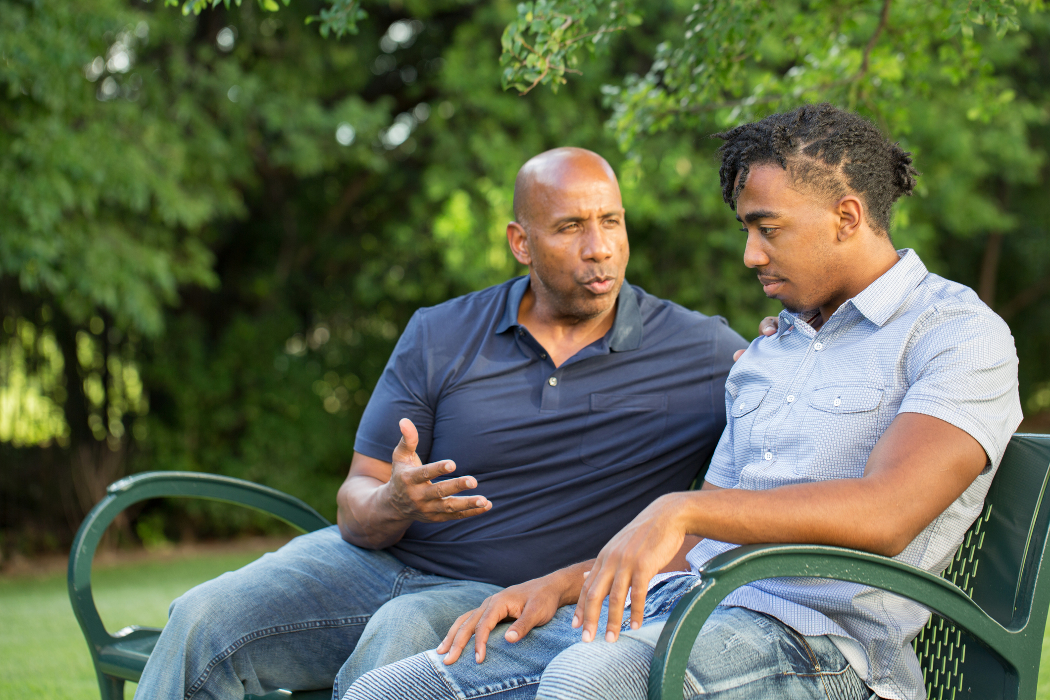 Portrait of an African American father and his son.