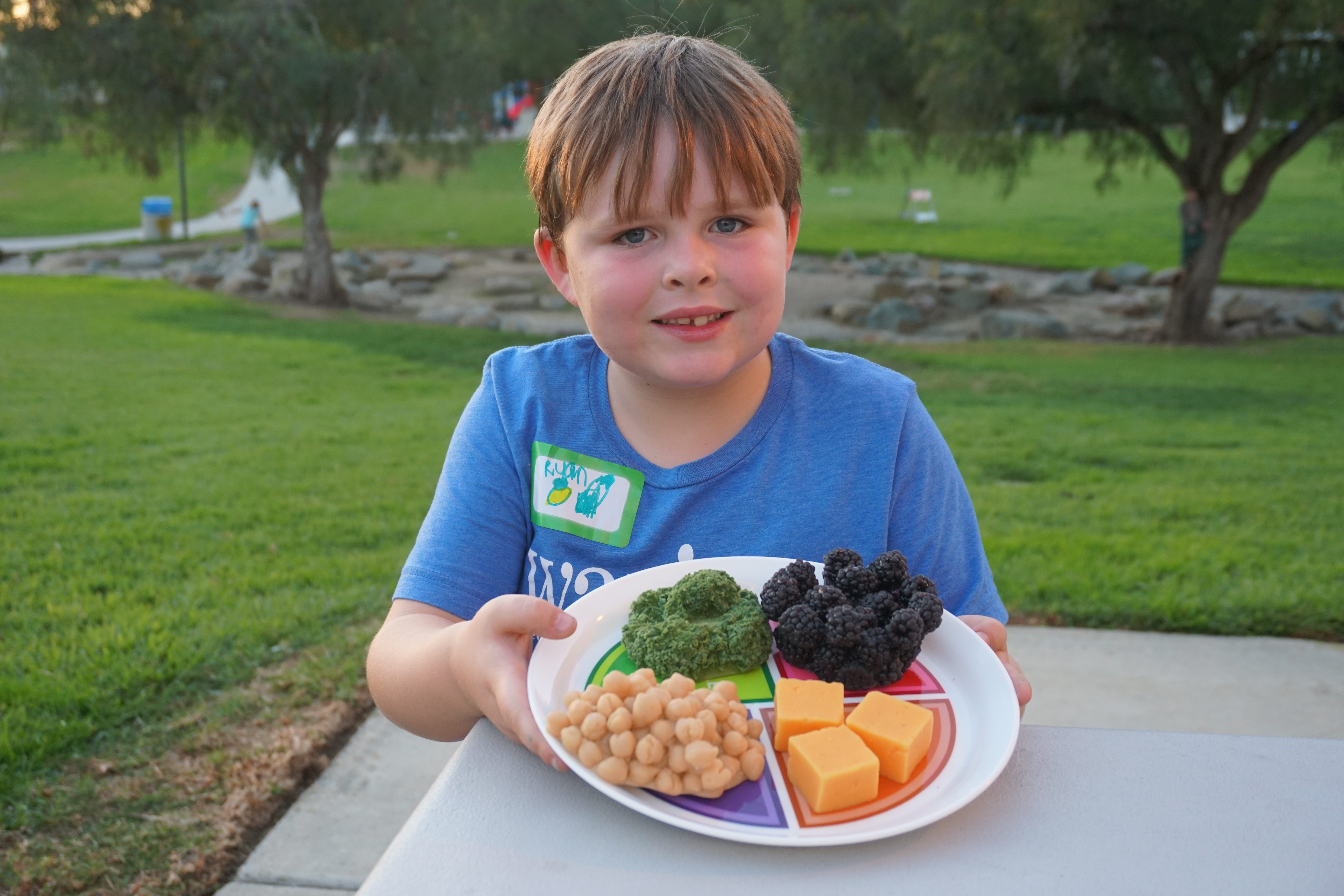 kid with healthy meal